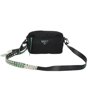 Prada shoulder bag triangle logo studs black green